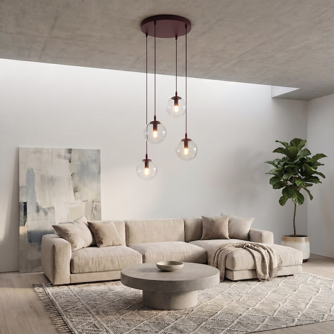 Vue en situation dans un salon, canapé beige, plafond béton et plante verte