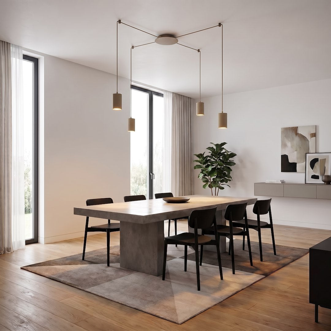 Mise en ambiance au-dessus d'une table à manger en béton, intérieur clair et moderne.