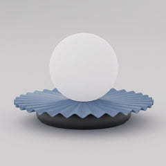 Lampe à poser Umbra bleue, verre blanc