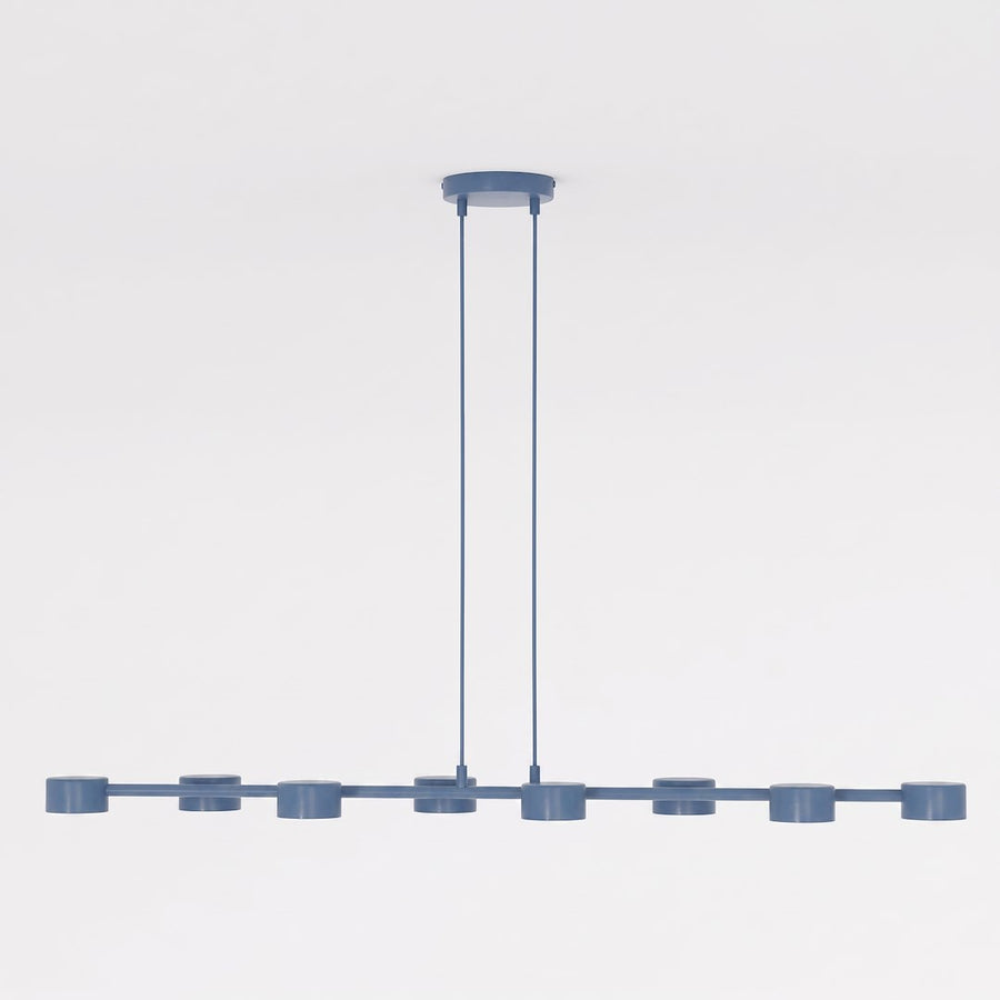 Vue de face du luminaire bleu et de ses huit diffuseurs cylindriques alignés