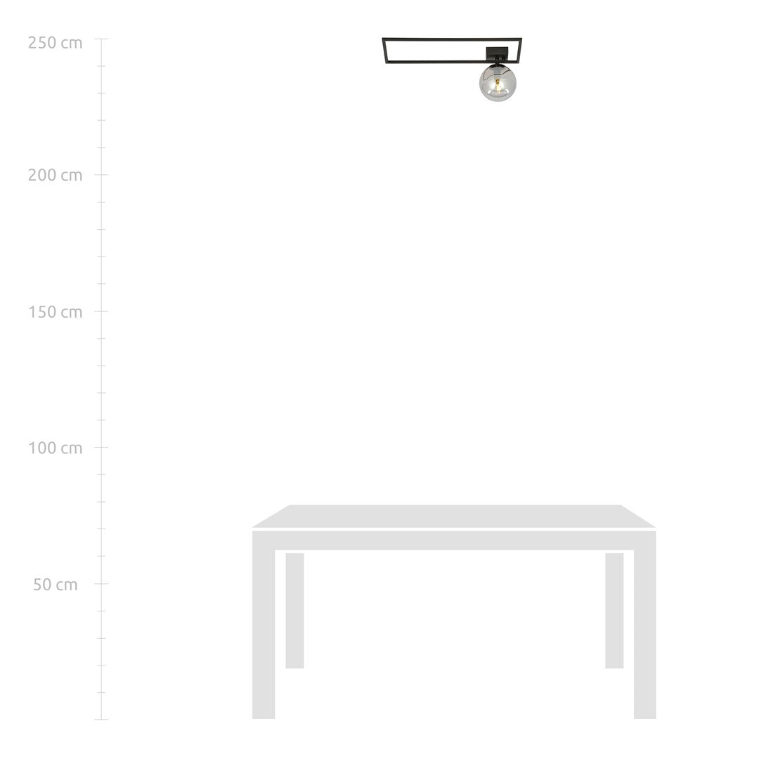 Schéma de dimensions montrant le luminaire fixé au plafond au-dessus d'une table