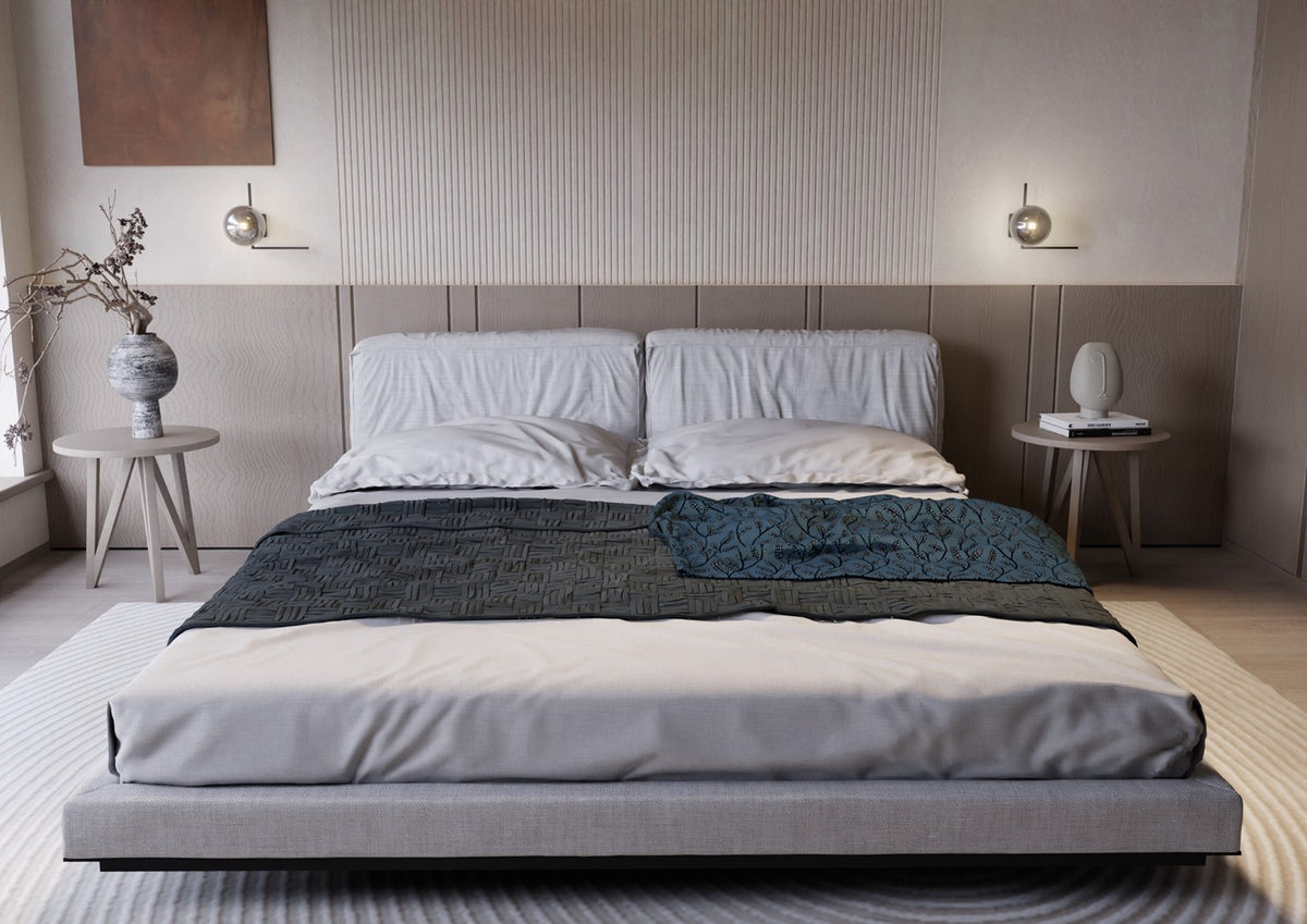 Mise en ambiance de deux appliques de part et d'autre d'un lit gris