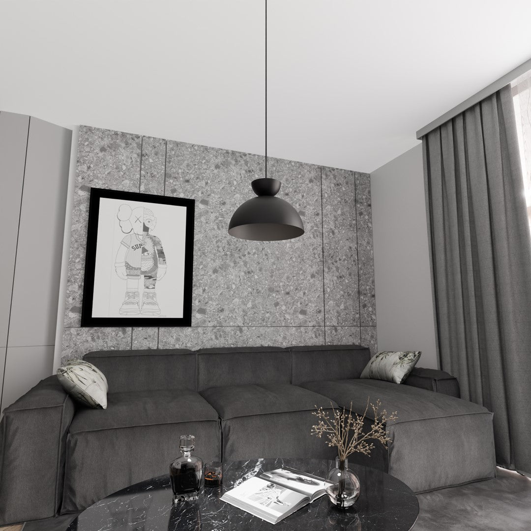 Mise en ambiance dans un salon gris, luminaire suspendu au-dessus du canapé