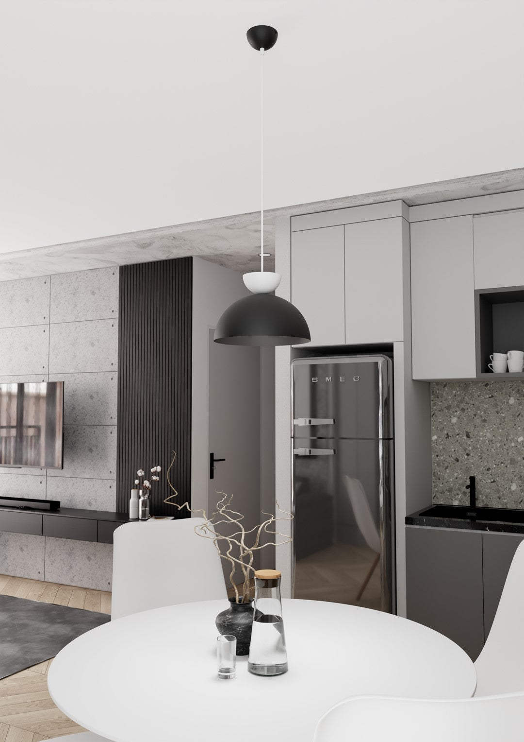 Ambiance cuisine moderne, luminaire suspendu au-dessus d'une table ronde blanche dressée