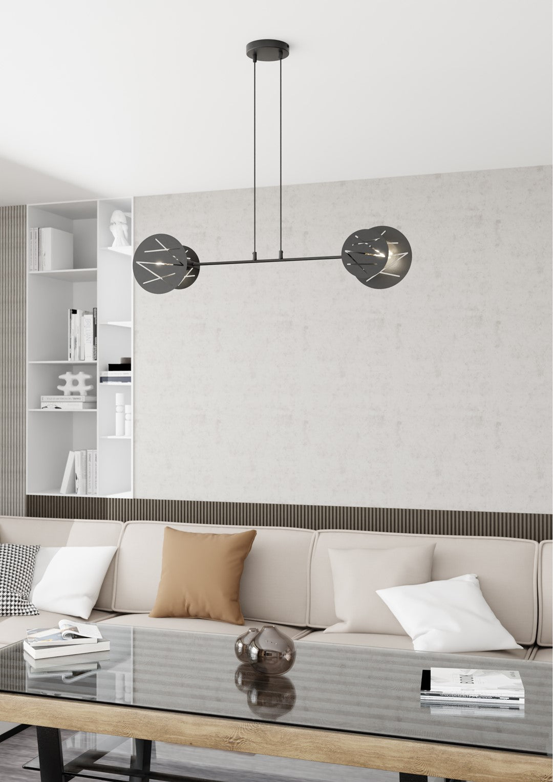 Mise en ambiance du salon avec la suspension noire au-dessus d'une table basse.