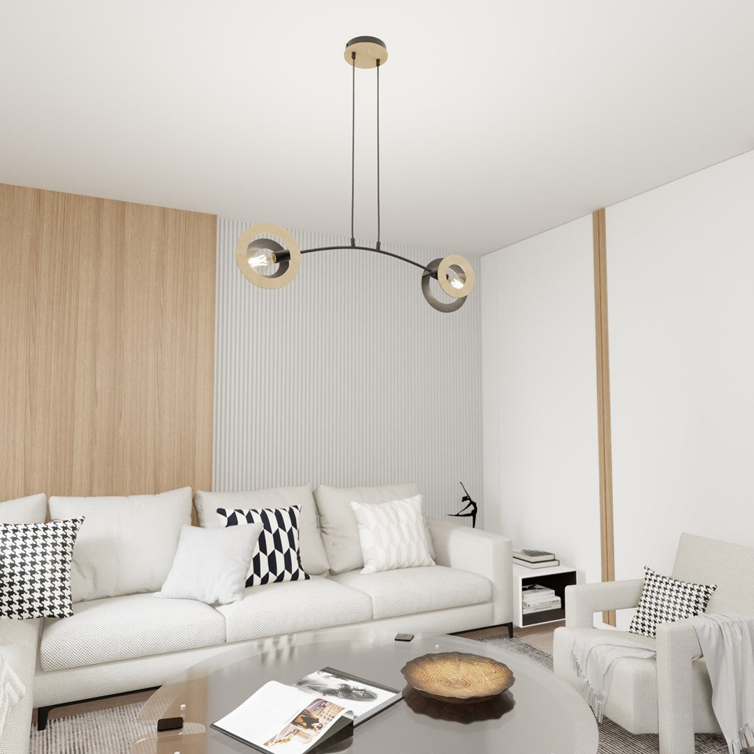 Suspension à deux lumières éclairant un salon blanc avec canapé et parquet clair