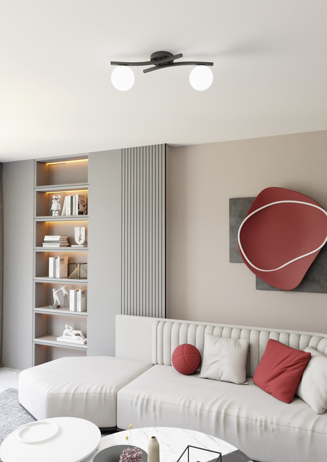 Mise en ambiance dans un salon avec canapé, bibliothèque et tableau rouge.