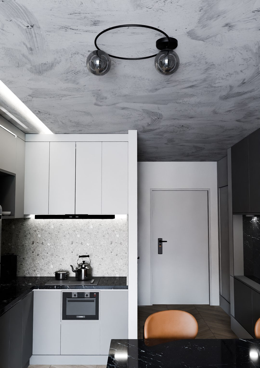 Vue en plongée du luminaire dans une cuisine moderne aux façades claires