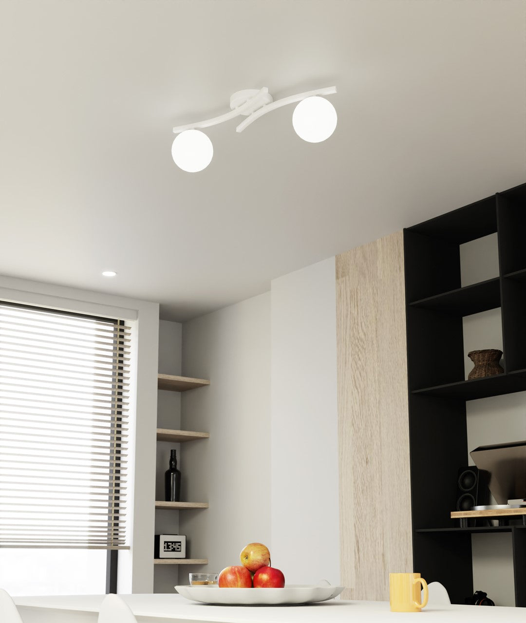 Mise en ambiance dans un séjour, luminaire allumé au-dessus de la table