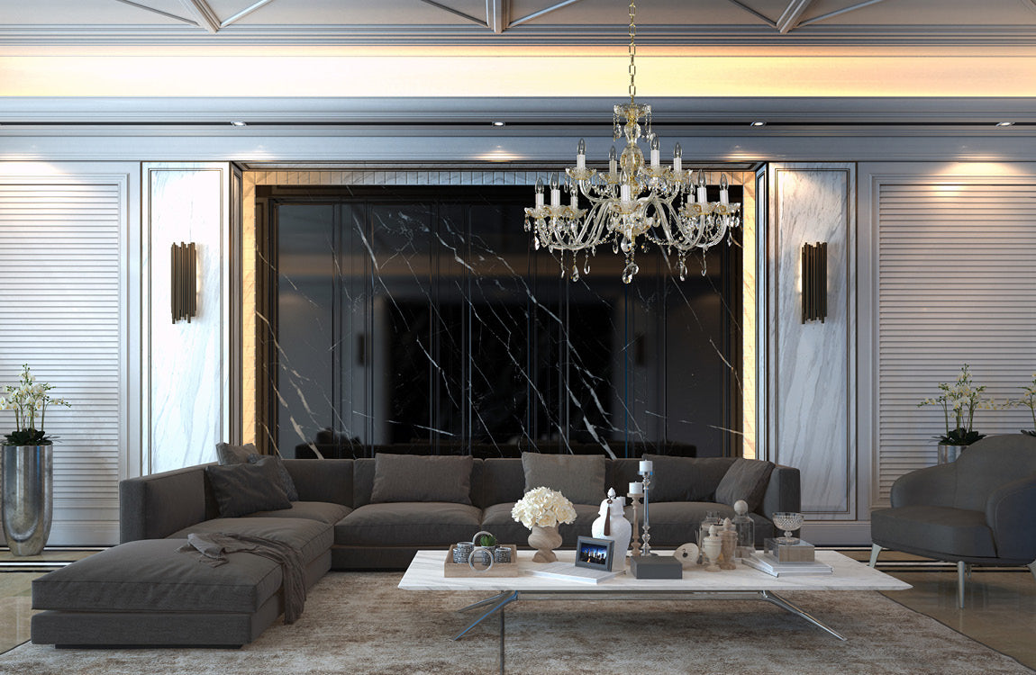 Lustre suspendu au-dessus d'un salon contemporain gris, grand plafond mouluré et tableau