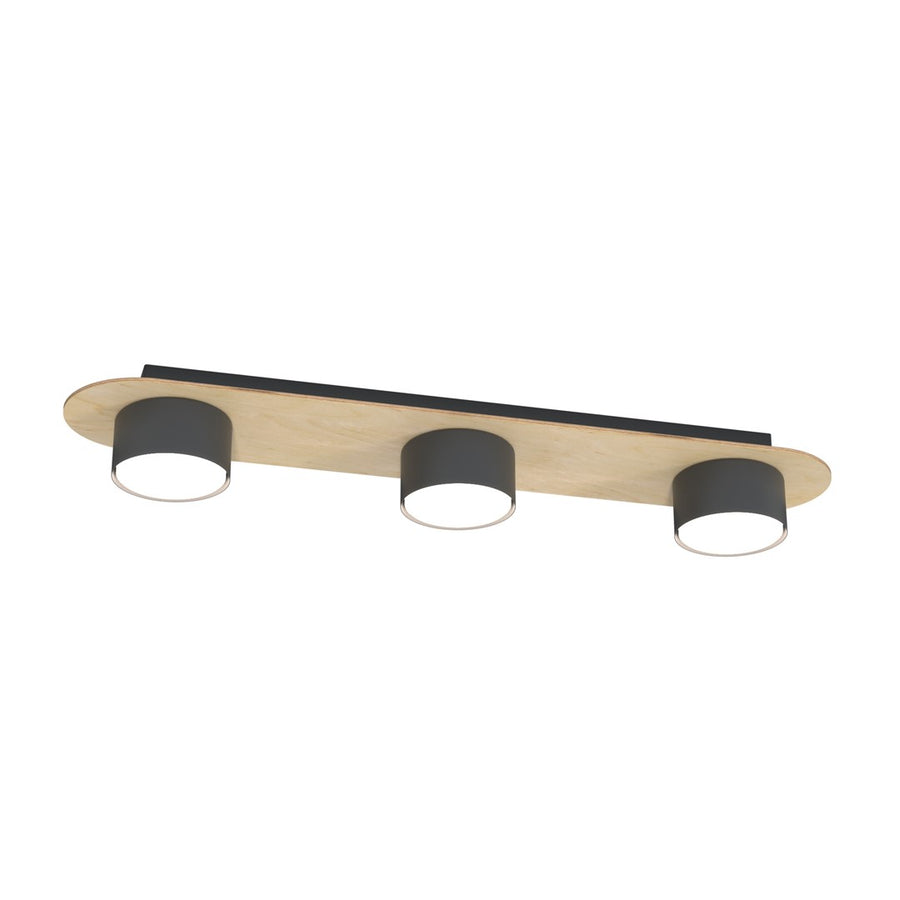 Plafonnier trois spots cylindriques noirs sur platine ovale en bois clair, vue de face