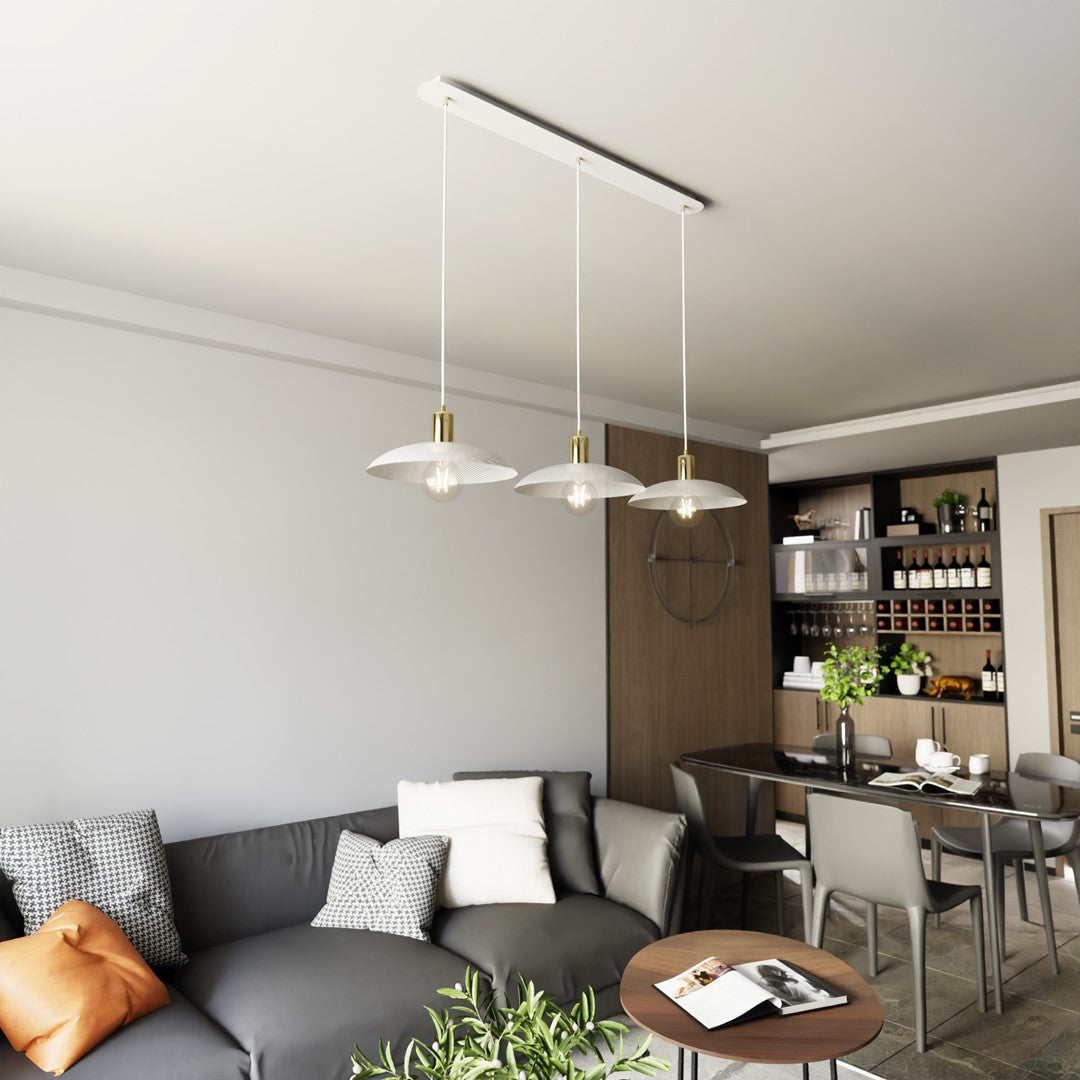 Suspension blanche installée dans un séjour contemporain au-dessus d'une table à manger.