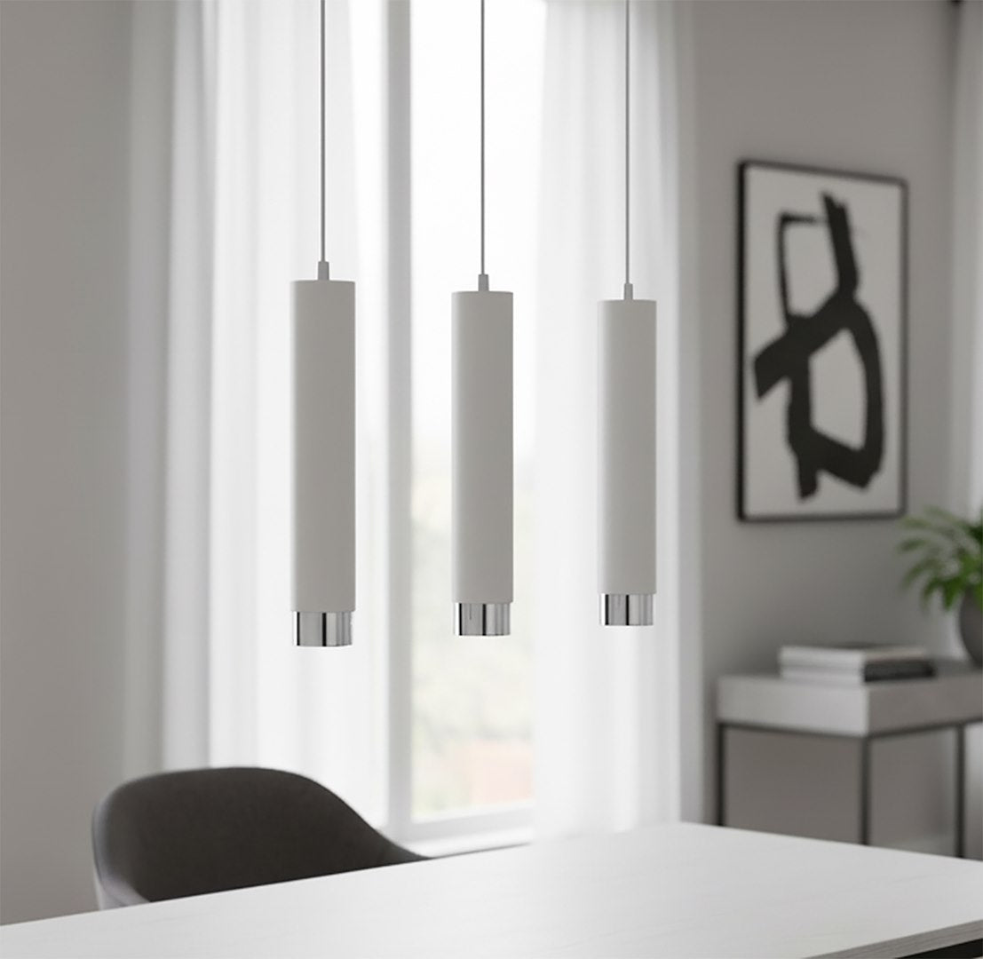 Vue rapprochée des cylindres blancs et de leur embout chromé, intérieur avec cadre