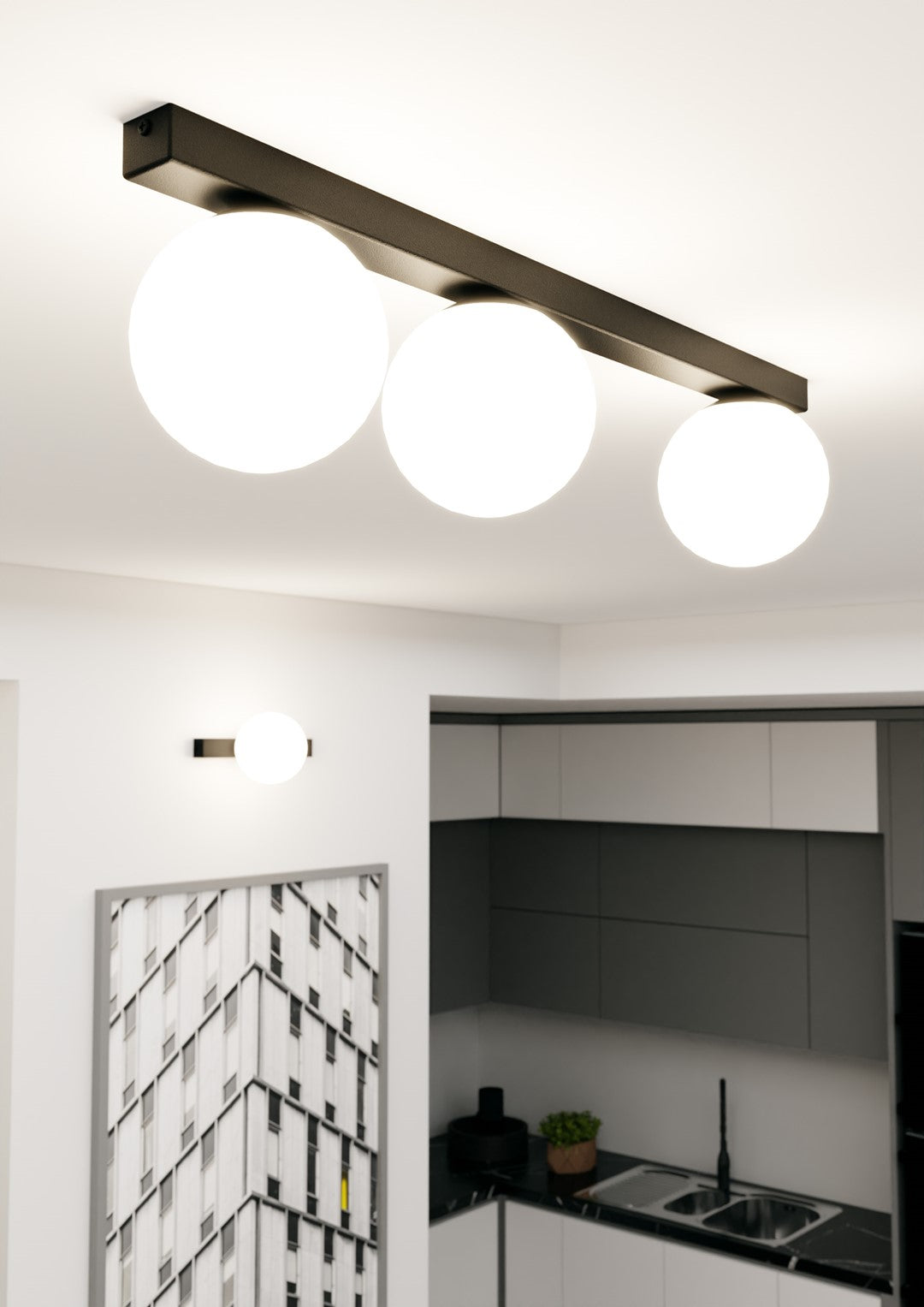Mise en ambiance au plafond d'une cuisine moderne, luminaire allumé au-dessus du plan de travail.