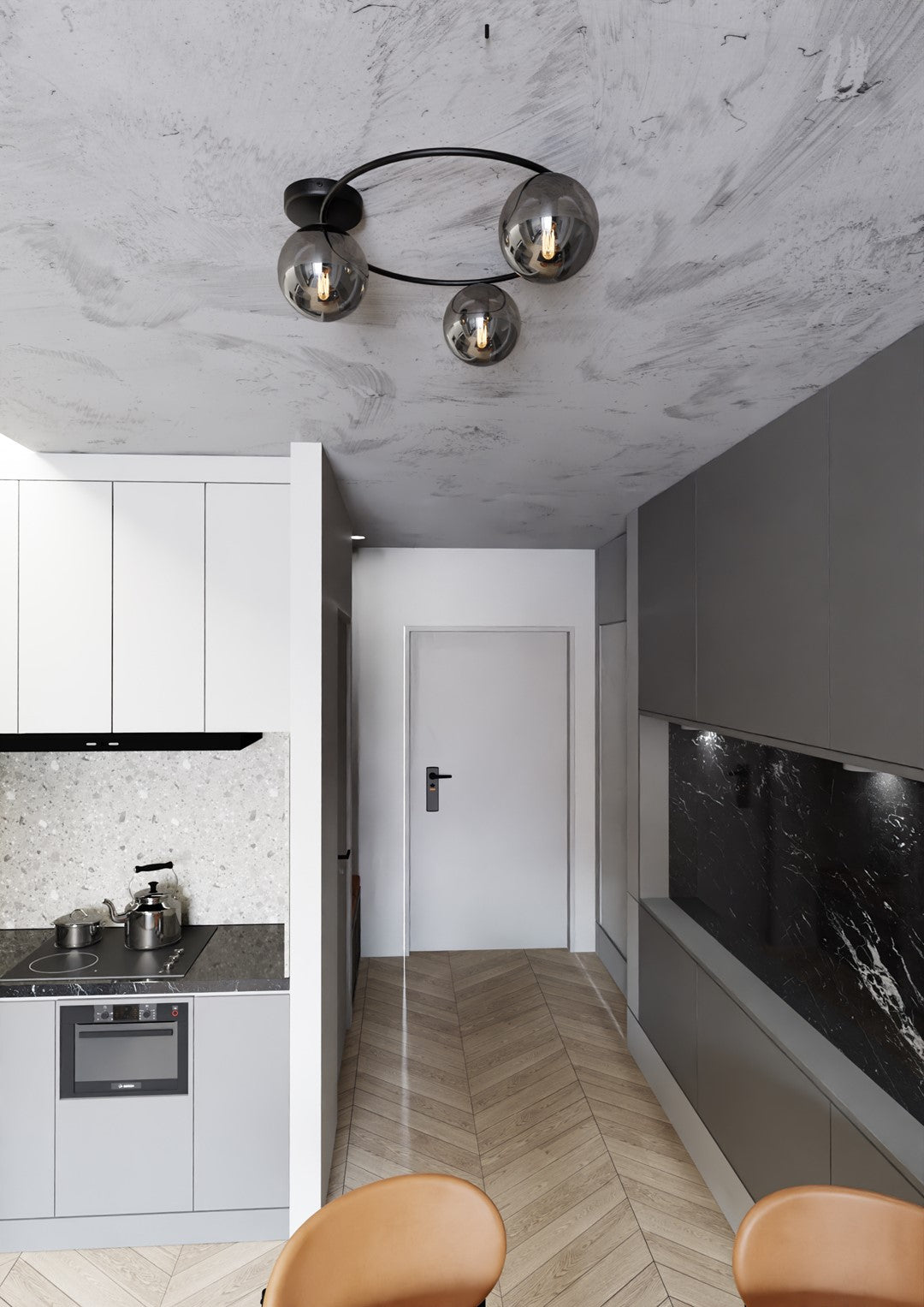 Plafonnier installé au plafond béton dans un couloir de cuisine gris et noir