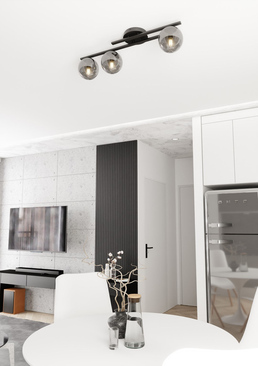 Mise en scène dans une pièce à vivre avec table blanche et cuisine