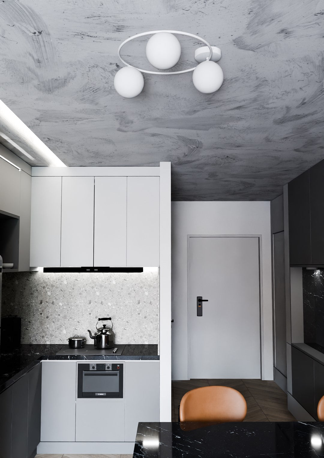 Luminaire éteint au plafond d'une cuisine, vue plongeante sur les plans de travail