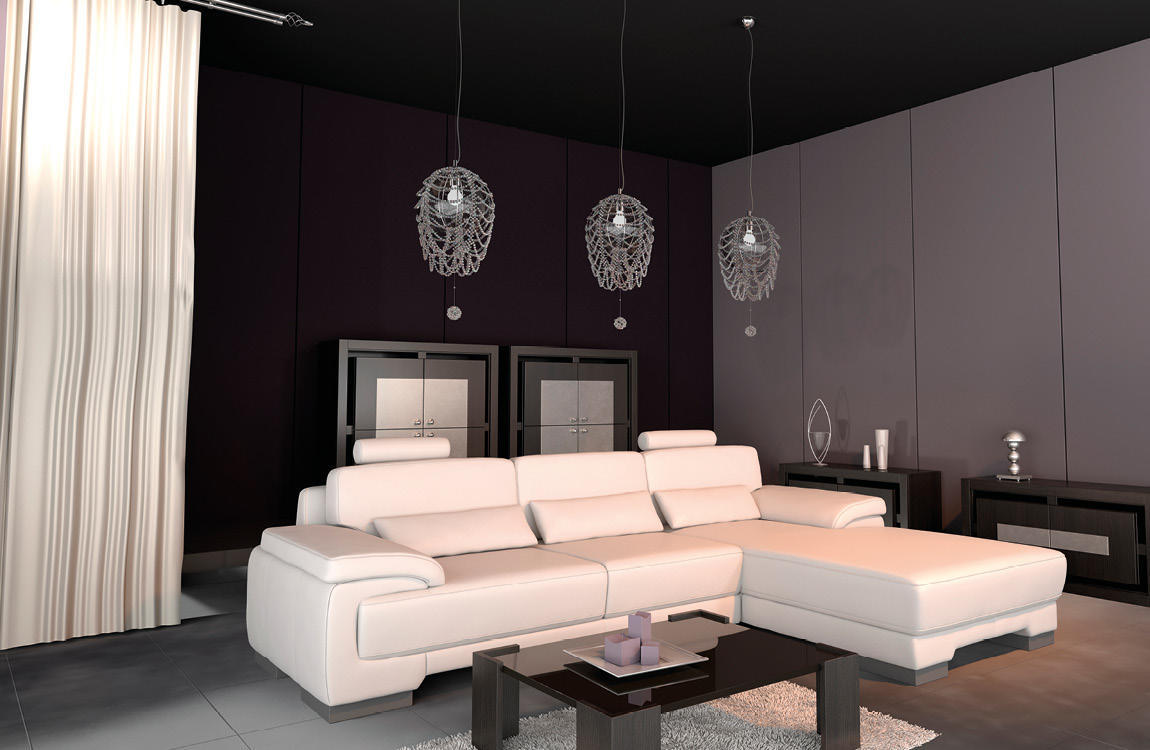 Mise en ambiance salon moderne avec trois suspensions cristal alignées au-dessus du canapé beige