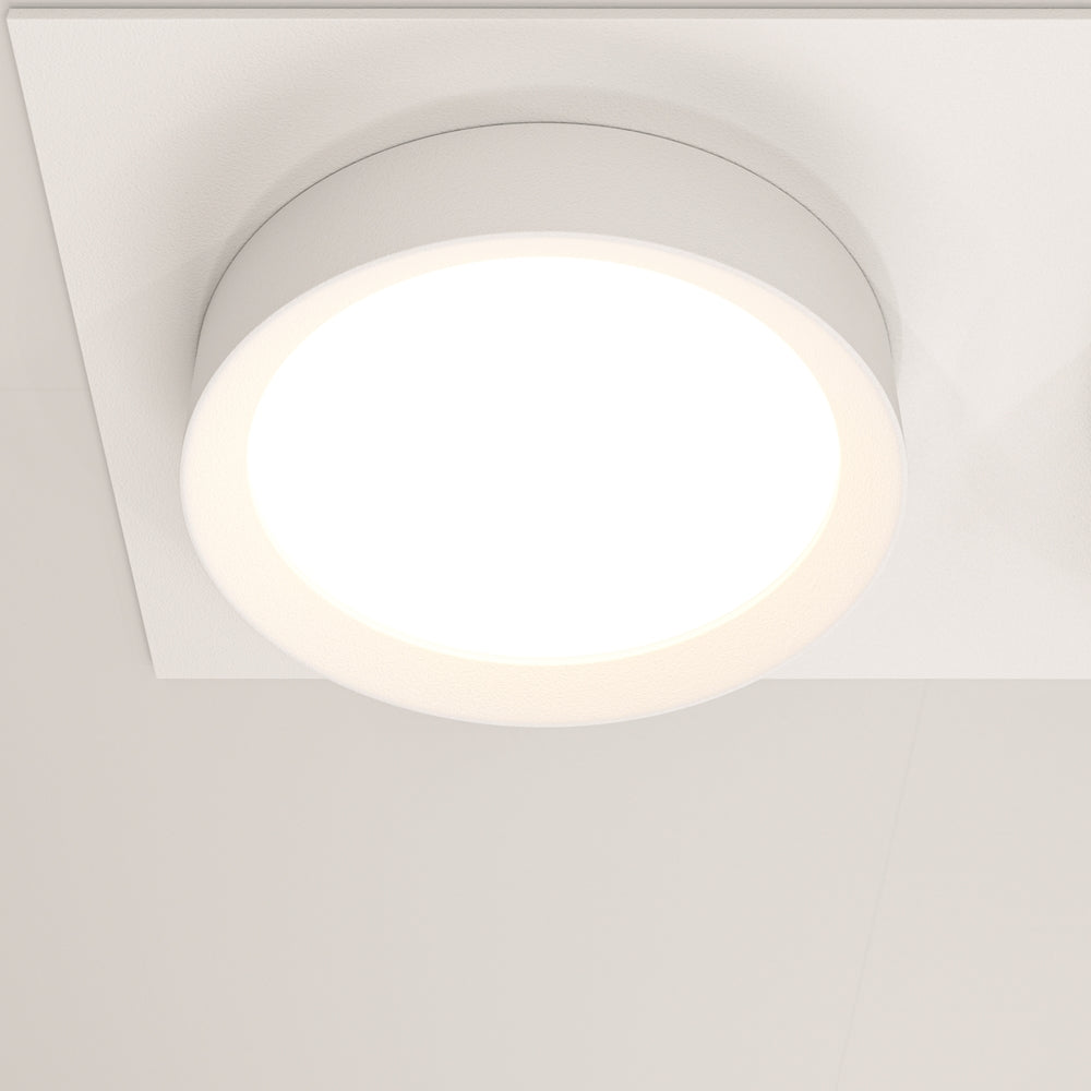 Vue rapprochée d'un module lumineux rond blanc, bord fin et diffuseur opale