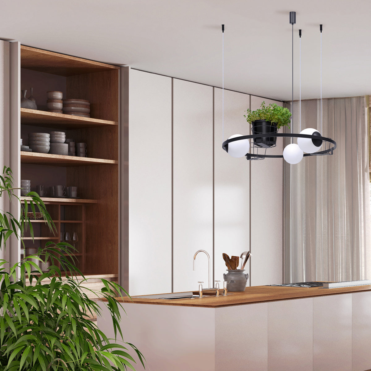 Scène de cuisine moderne avec le luminaire suspendu au-dessus de l'îlot