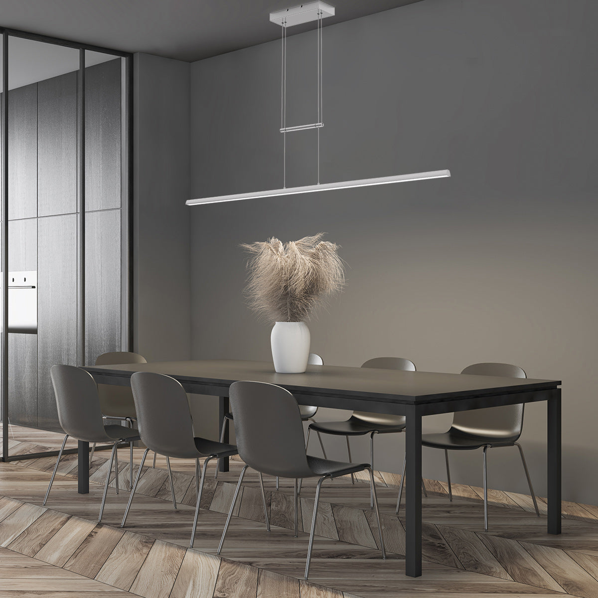 Suspension barre LED acier au-dessus d'une table de salle à manger