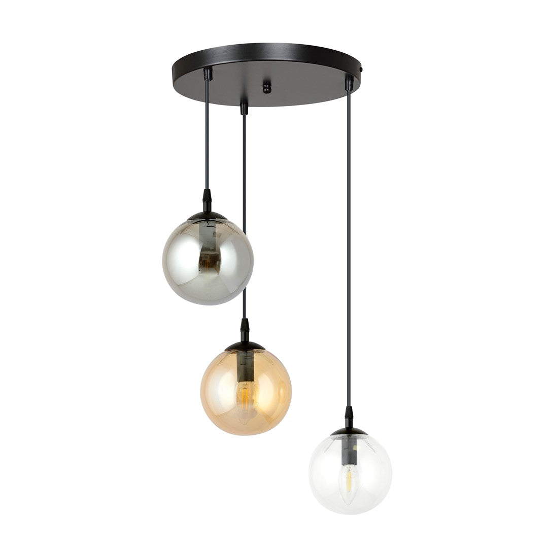 Vue rapprochée des trois globes suspendus à hauteurs différentes, verre fumé, ambré et transparent