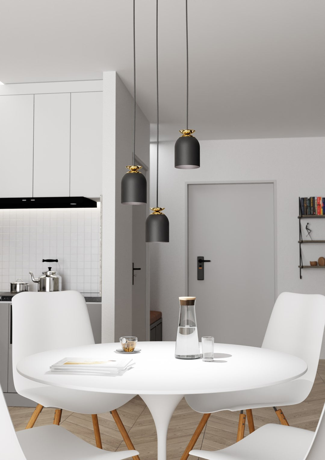 Vue en situation dans une cuisine ouverte blanche avec table dressée