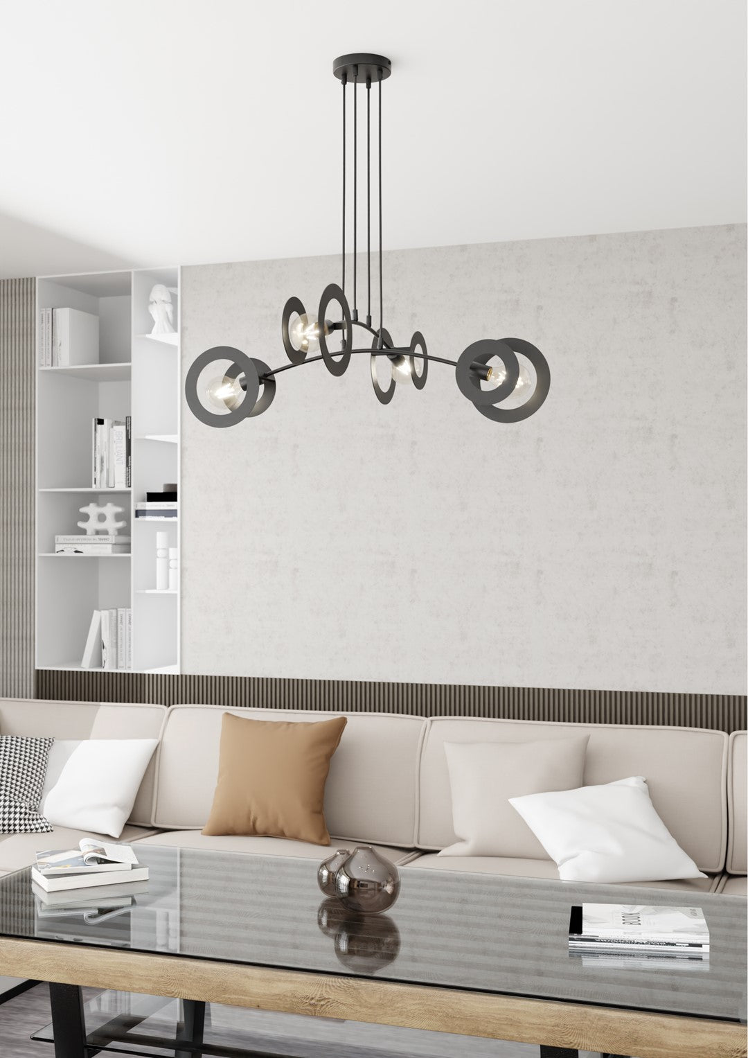 Suspension installée au-dessus d'un salon moderne avec canapé beige et bibliothèque.