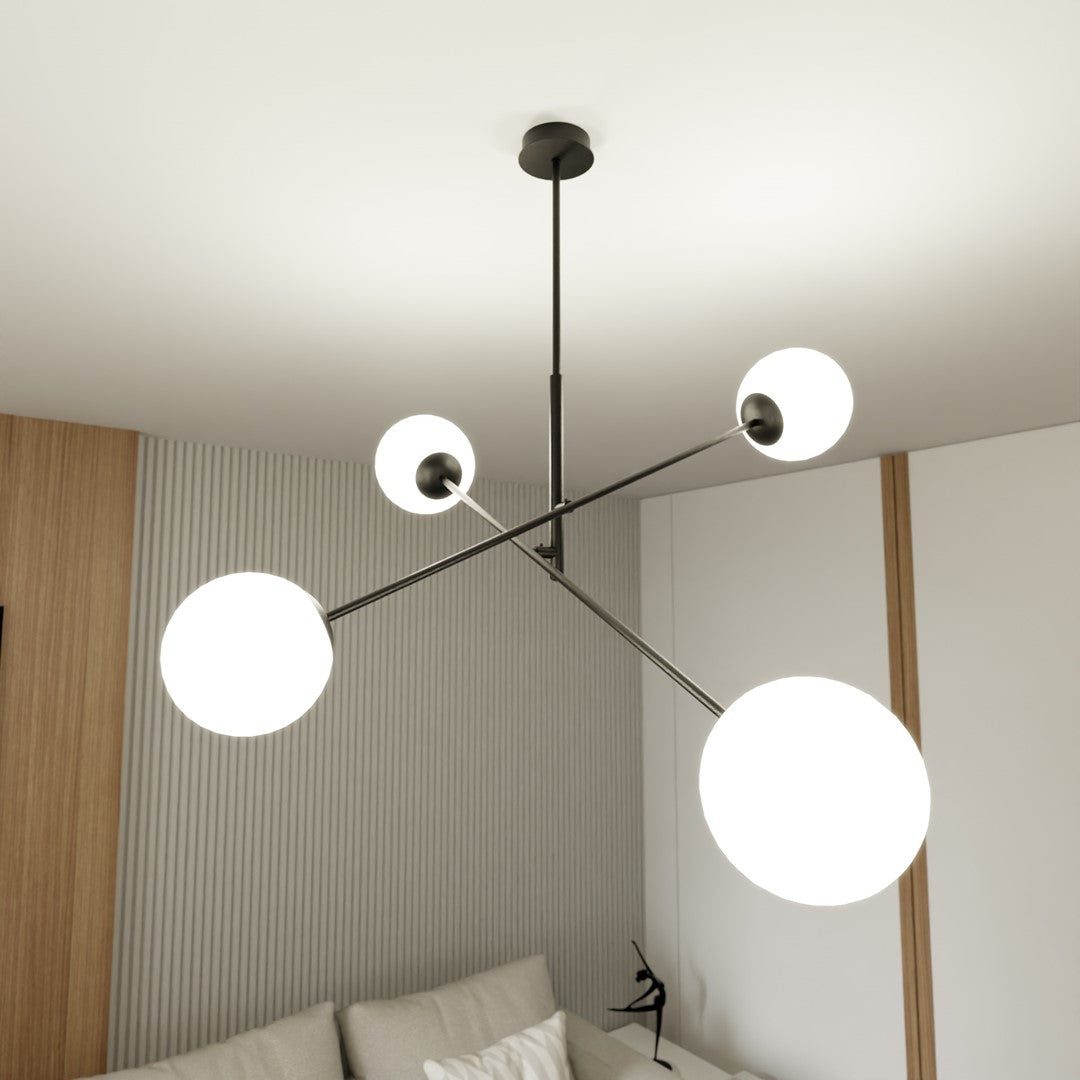 Vue plafond dans chambre, suspension allumée au-dessus d'une tête de lit