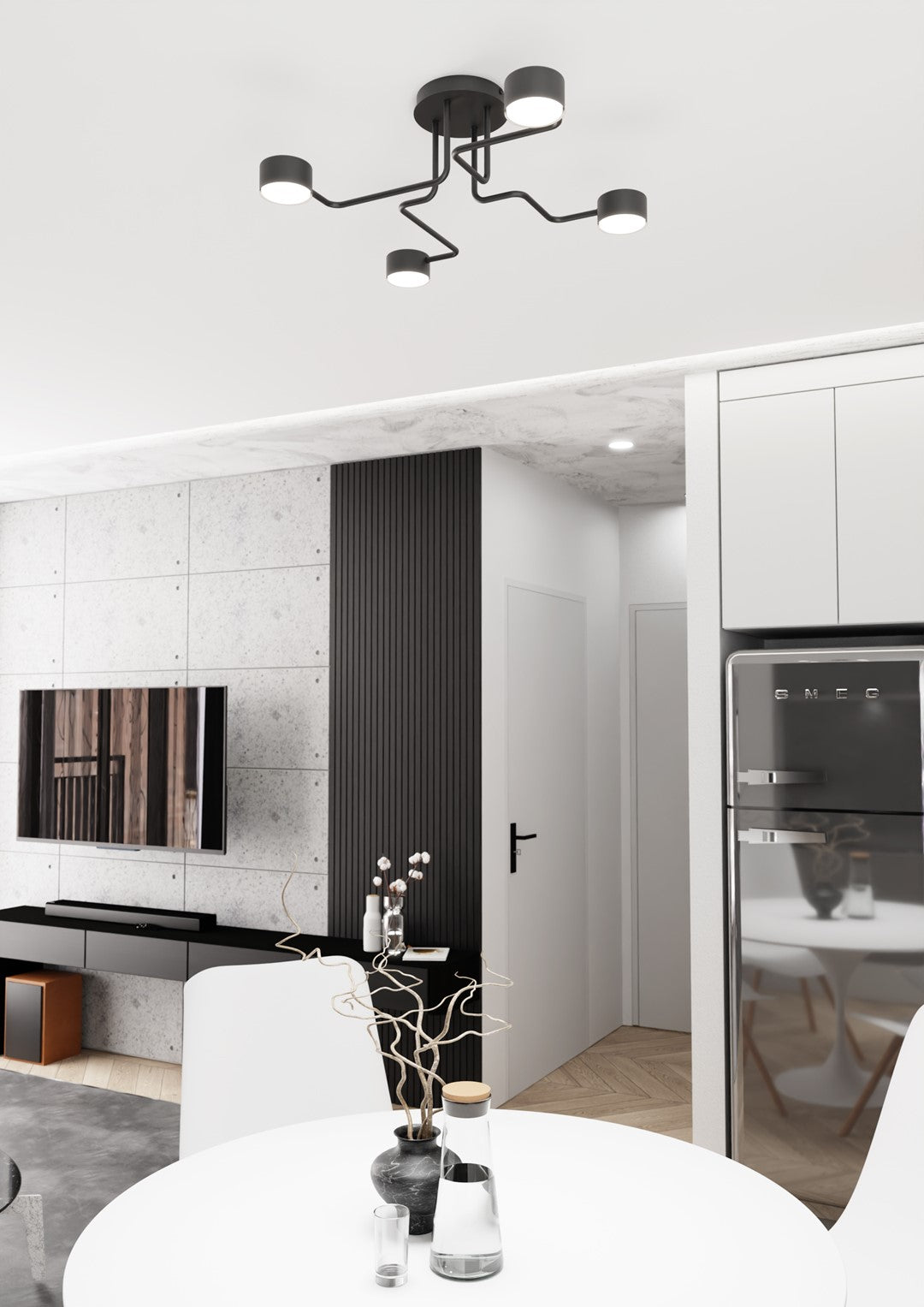 Luminaire installé au plafond au-dessus d'une table, dans une cuisine-salle à manger moderne.