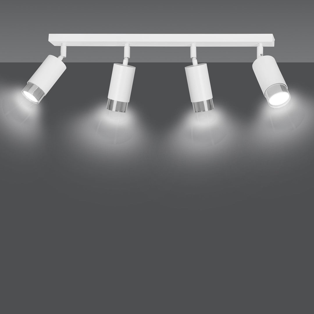 Mise en lumière du plafonnier sur fond gris, faisceaux lumineux visibles sous les spots