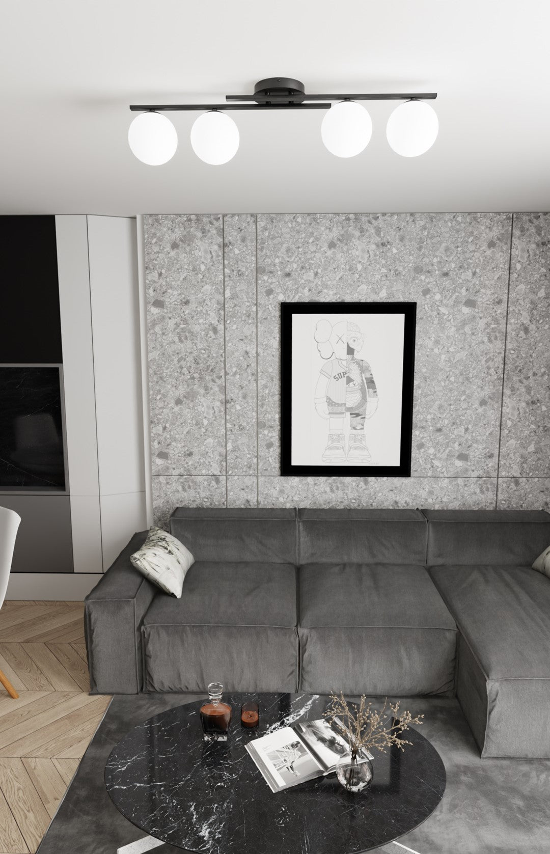 Mise en ambiance dans un salon gris, luminaire allumé au plafond au-dessus du canapé