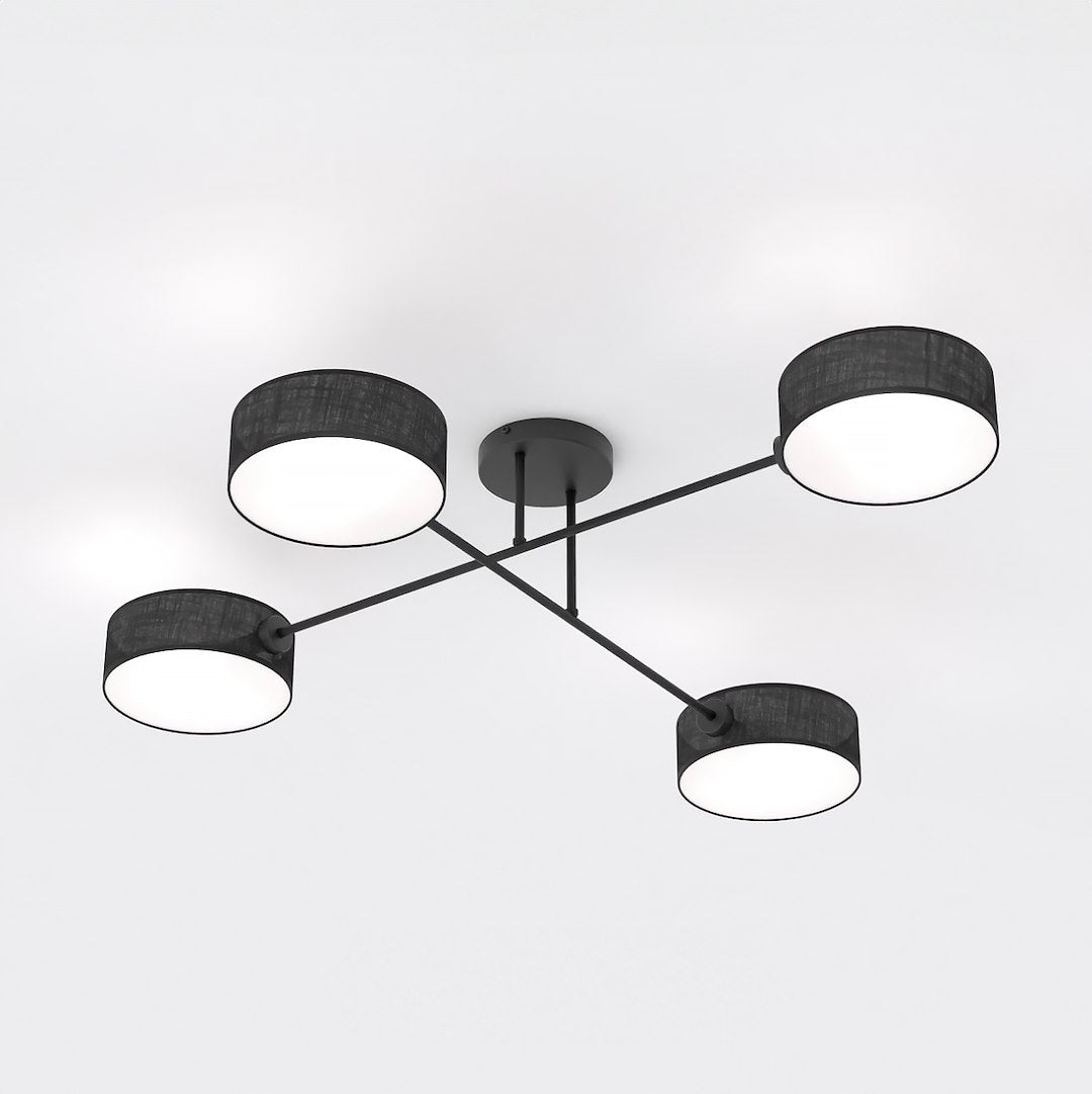 Vue de trois quarts du luminaire dévoilant la structure en croix et les bras métalliques