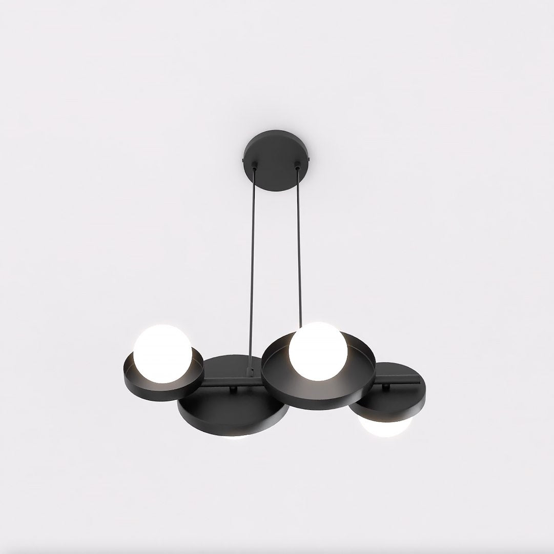 Vue de dessous montrant les quatre disques noirs et leurs globes lumineux