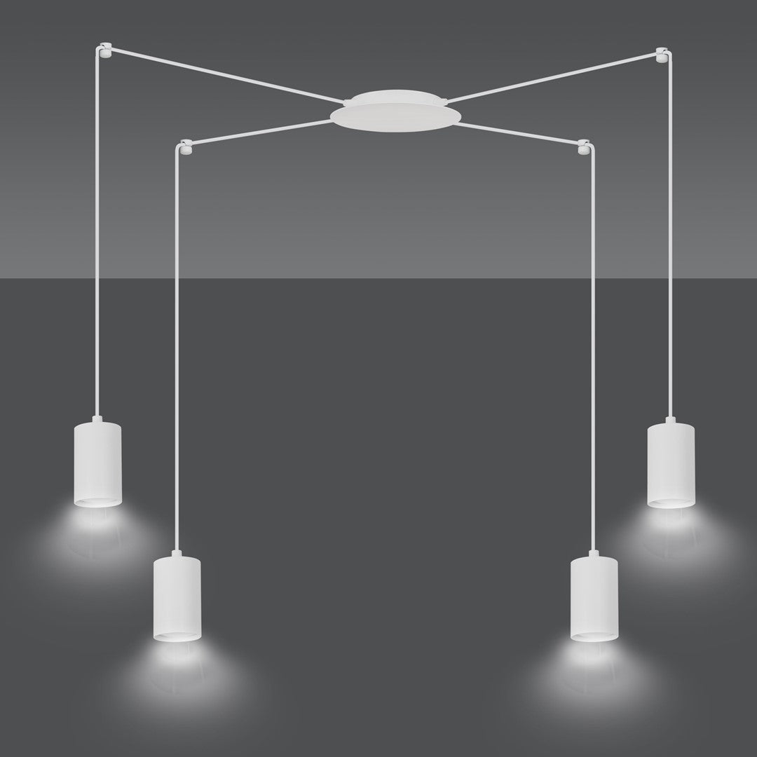 Quatre spots cylindriques blancs allumés projetant des cônes de lumière vers le bas