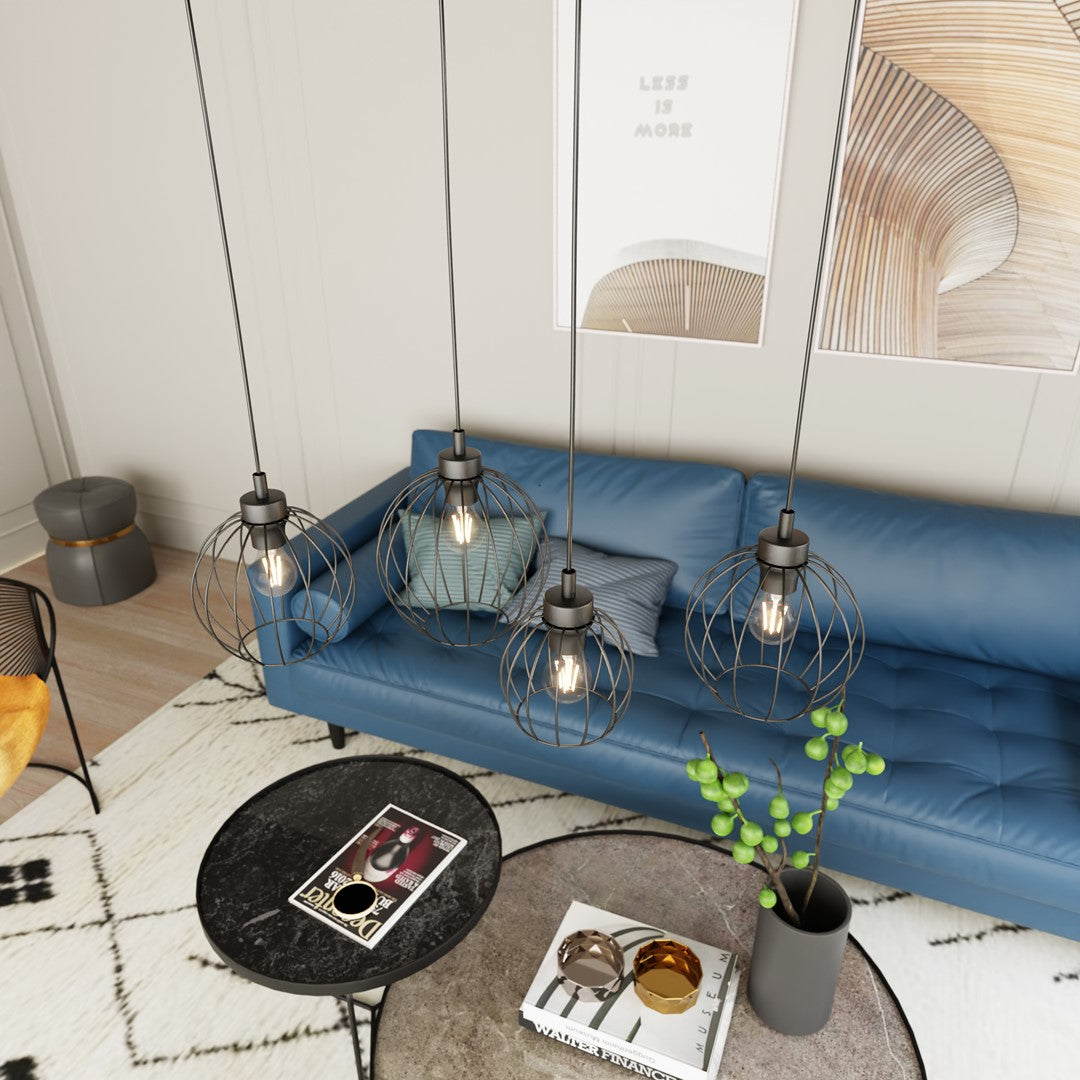 Vue plongeante sur le luminaire suspendu éclairé au-dessus d'une table basse et d'un tapis