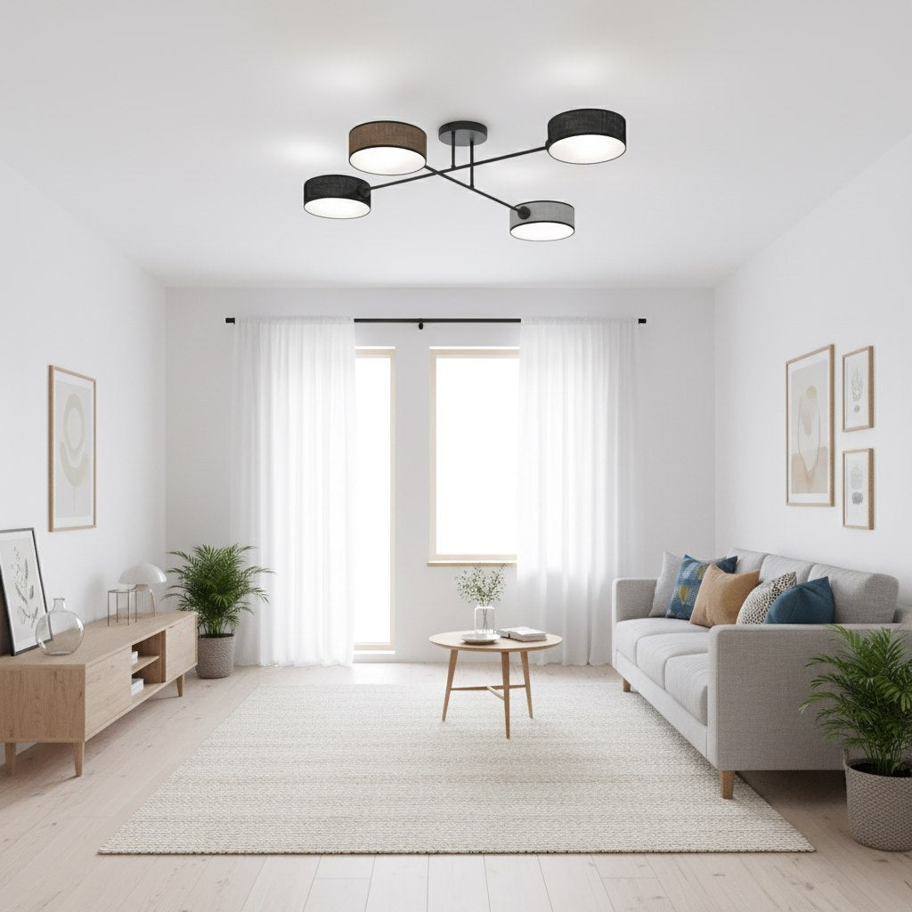 Mise en ambiance dans un salon clair, plafonnier allumé au-dessus d'un tapis beige