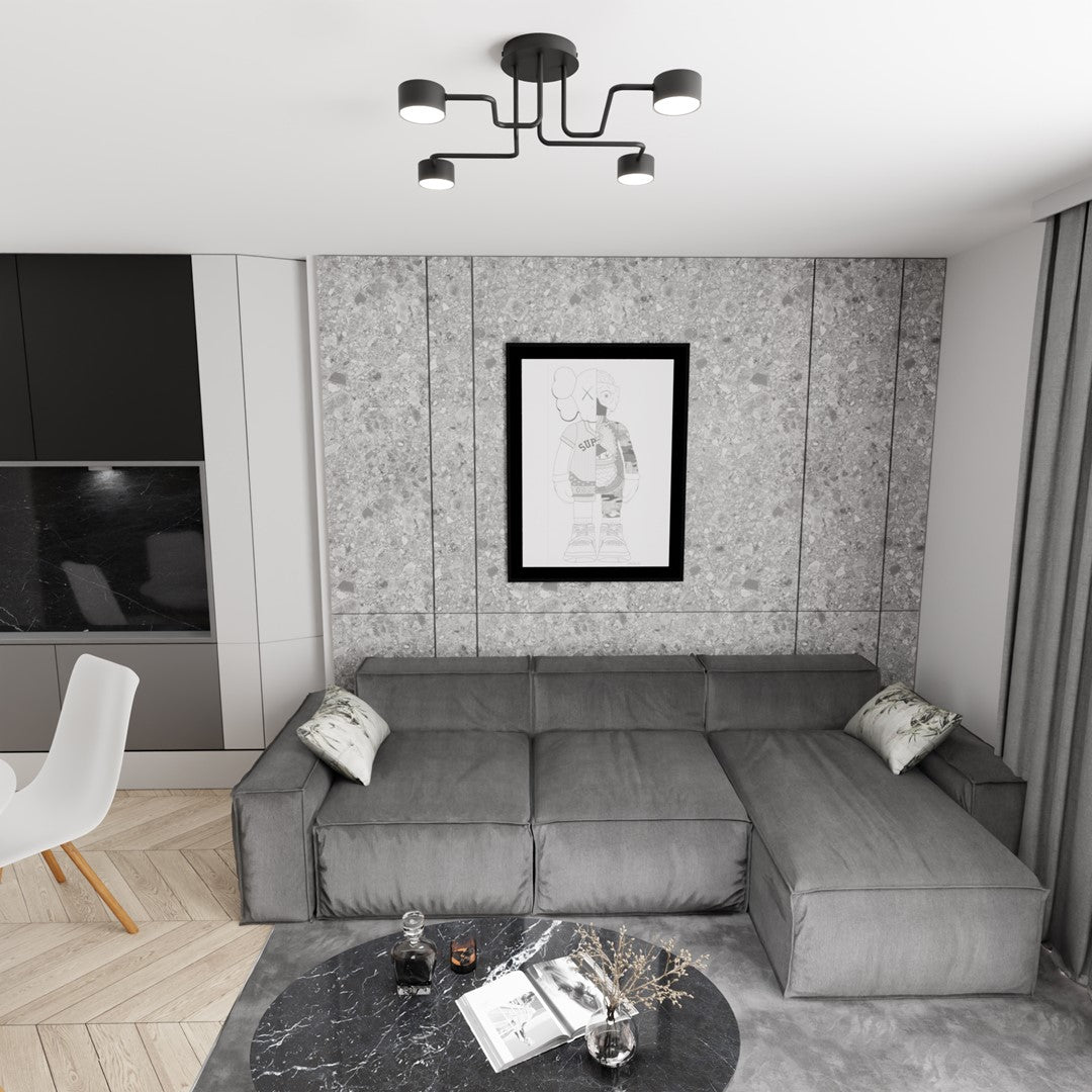 Même vue du salon contemporain avec le luminaire noir et le grand canapé gris.
