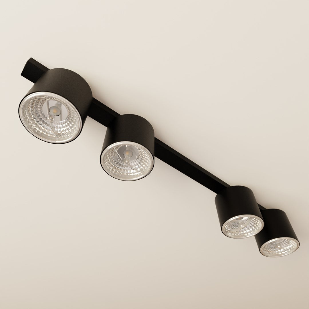 Détail des réflecteurs striés et ampoules LED visibles sous chaque spot