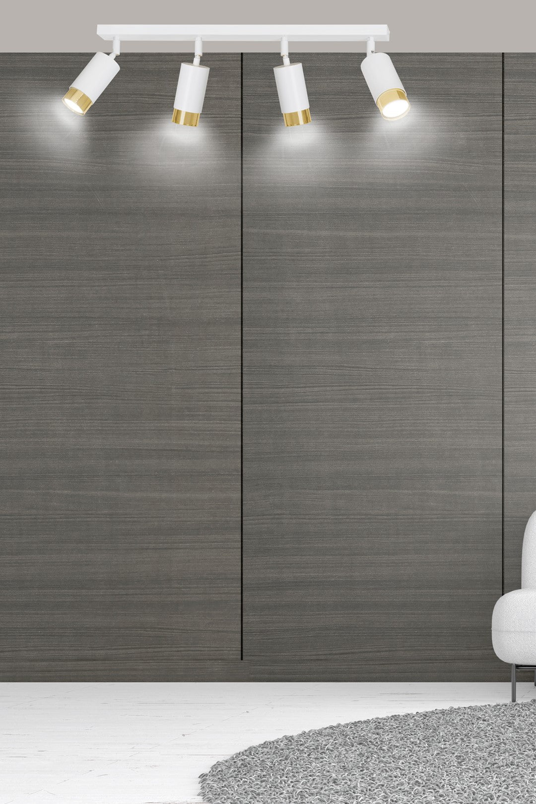 Mise en situation murale : plafonnier allumé au-dessus d'un mur gris texturé et d'une assise.