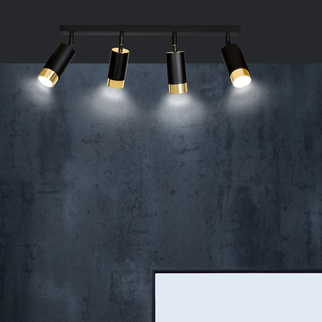 Ambiance mur béton gris avec luminaire allumé au-dessus d'un cadre