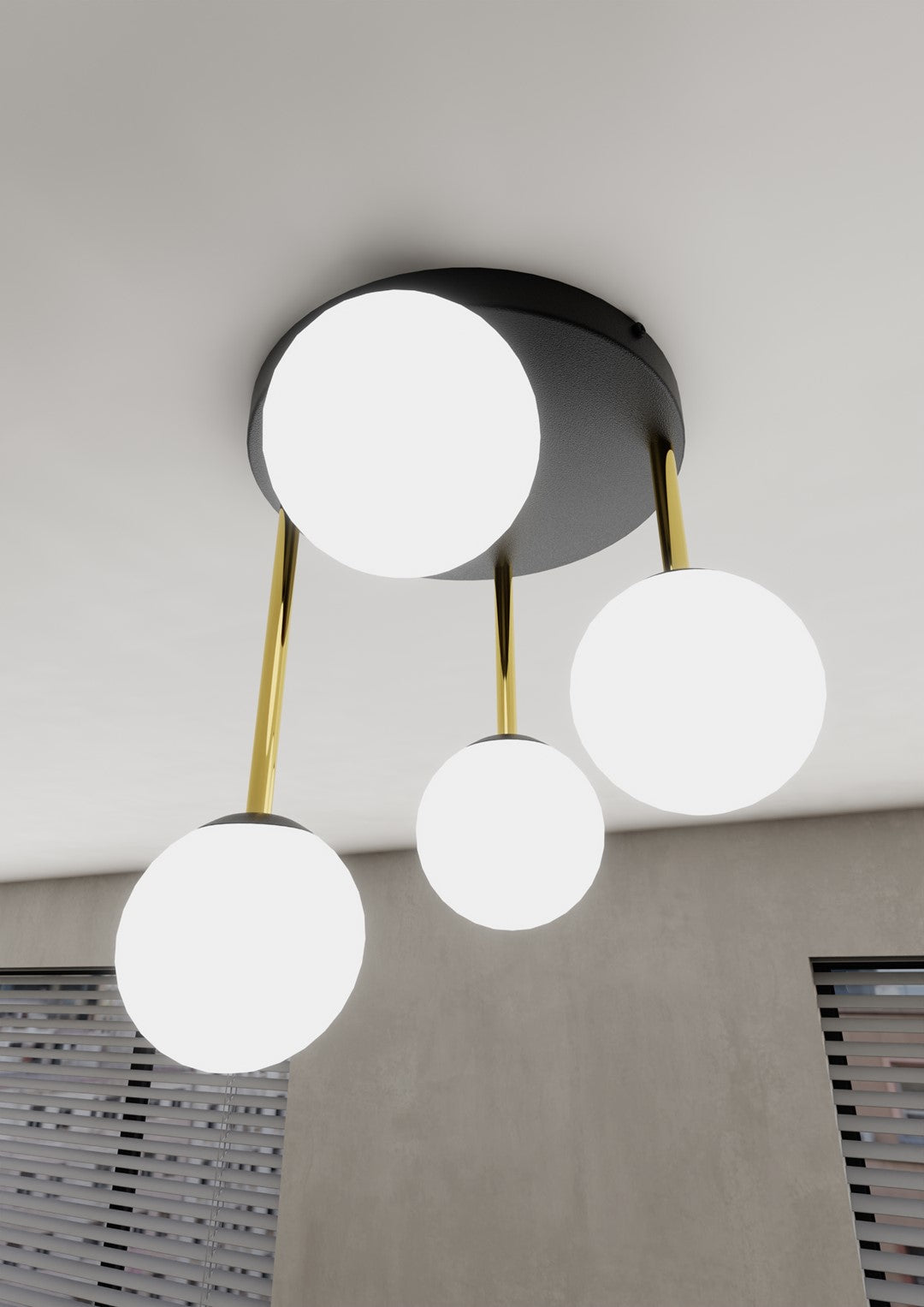 Détail rapproché des globes opalins allumés et des tiges dorées fixées au plafond