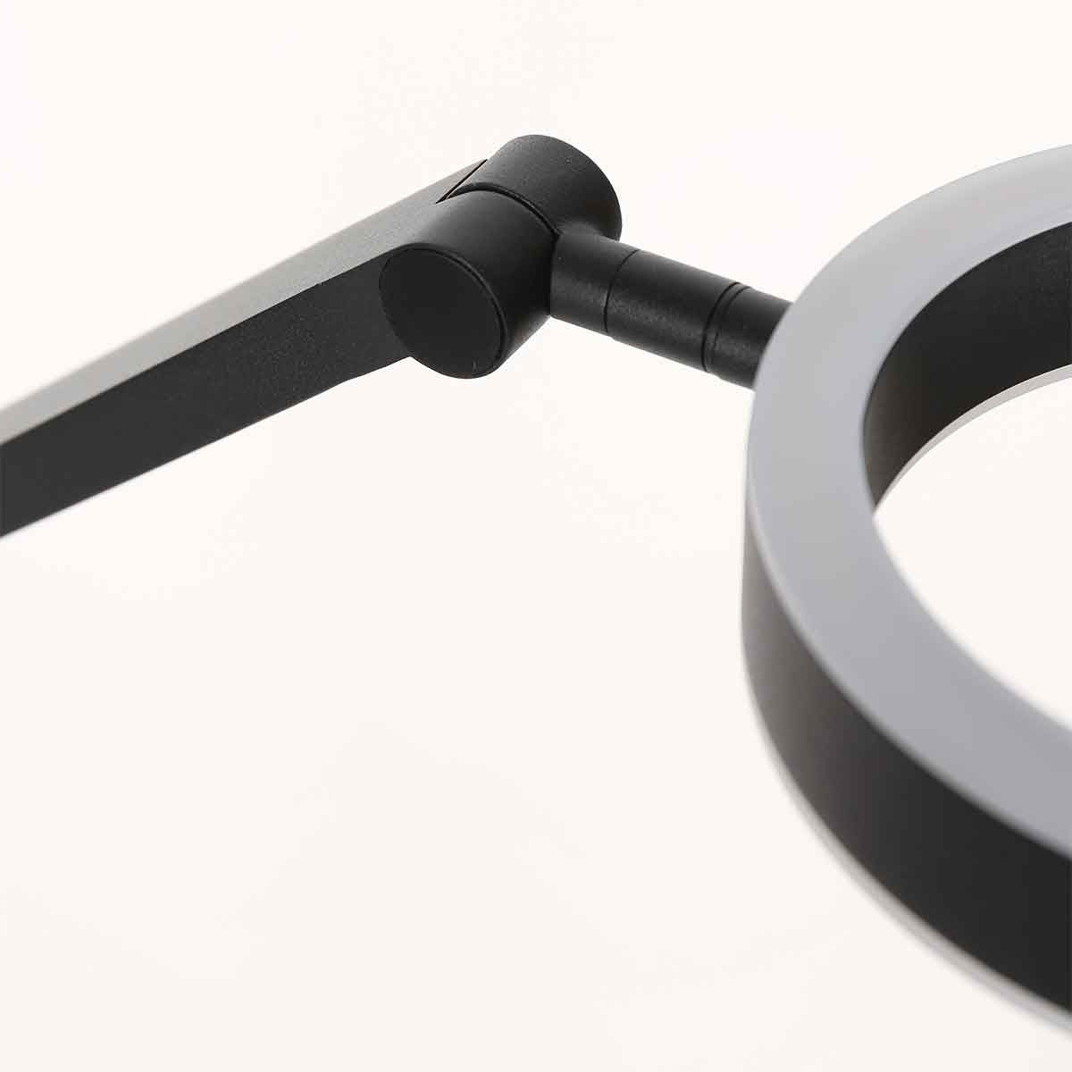 Détail de la rotule reliant le bras à la tête annulaire noire