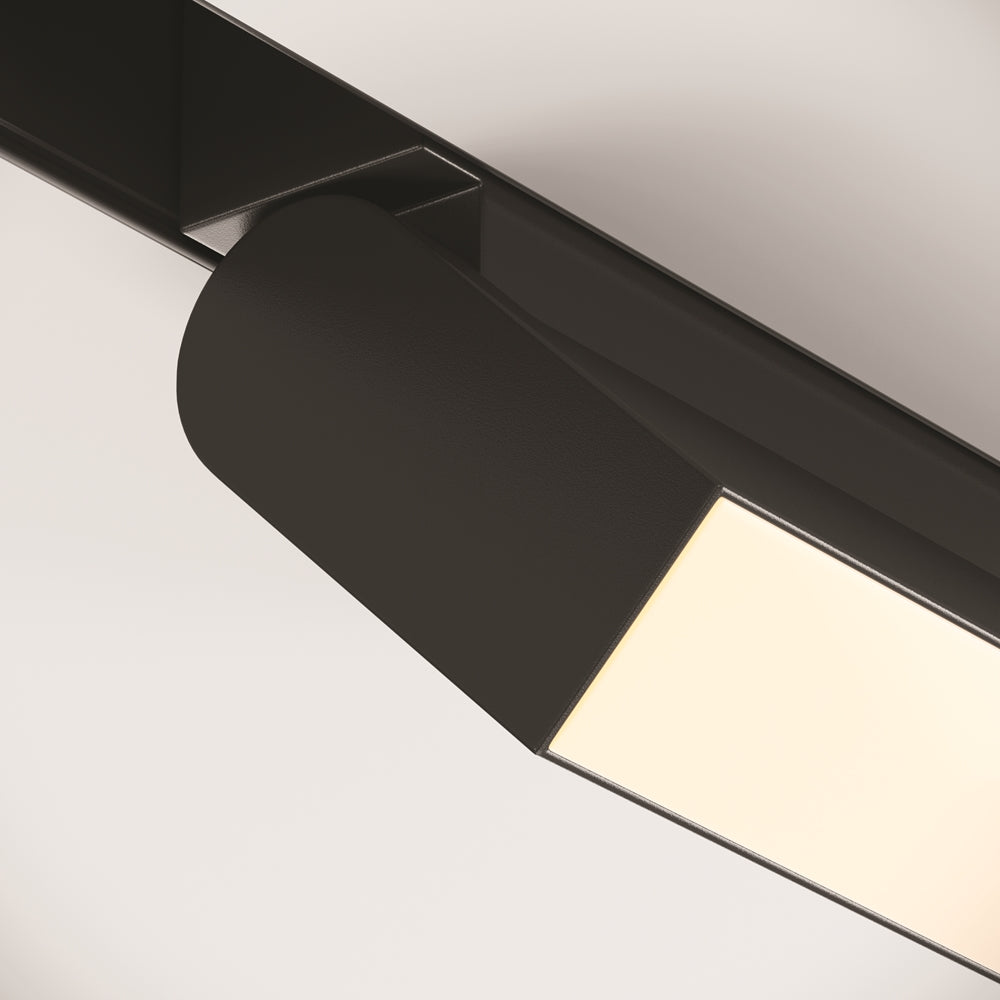 Détail rapproché de la finition noire mate et de la sortie de lumière