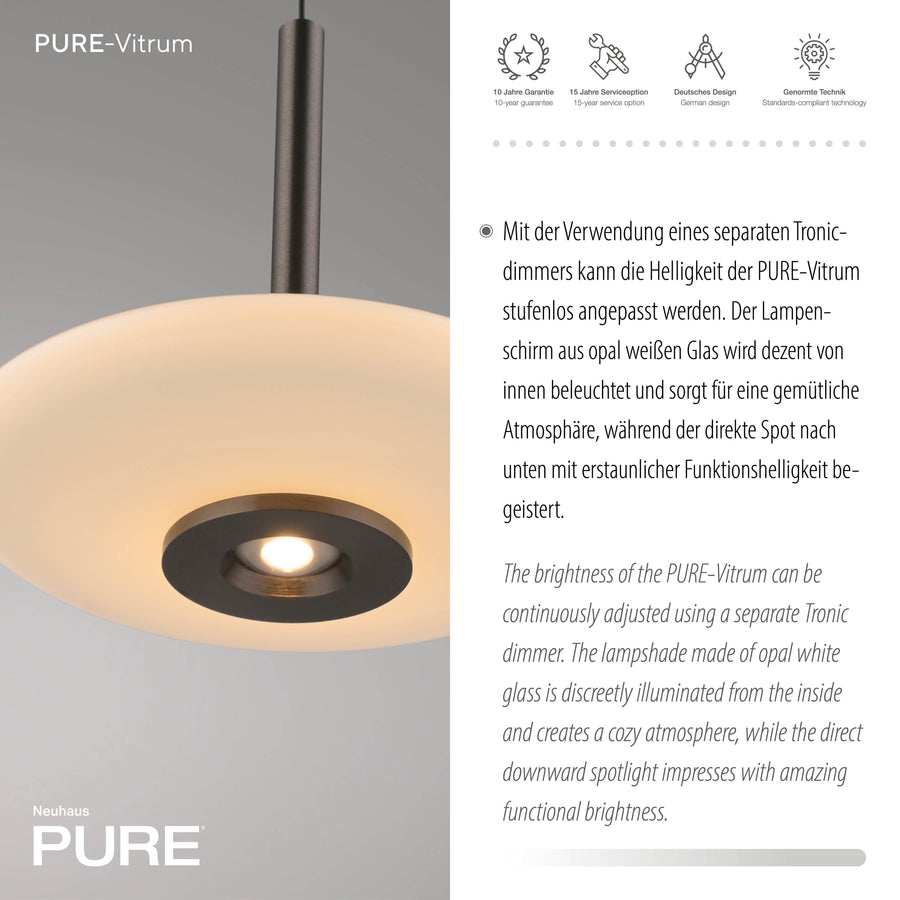 Gros plan sur l'abat-jour verre et le projecteur central, icônes de garantie visibles