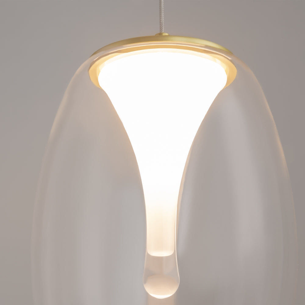 Détail du diffuseur conique lumineux et de la bague dorée supérieure