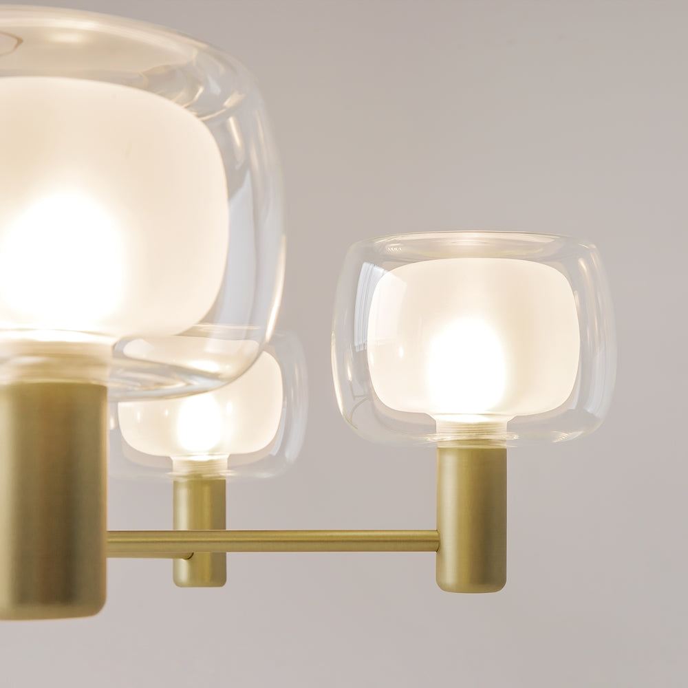 Détail rapproché des diffuseurs en verre avec partie intérieure opaline éclairée
