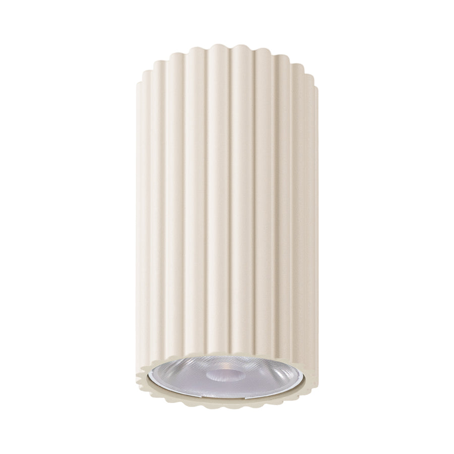 Version ivoire du plafonnier, stries verticales et diffuseur LED apparent.