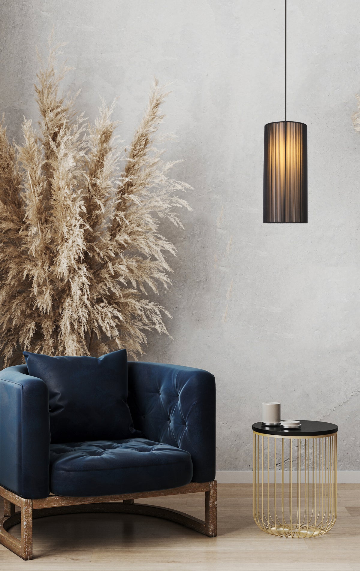Scène intérieure avec suspension cylindrique noire éclairée, fauteuil bleu et plantes séchées.