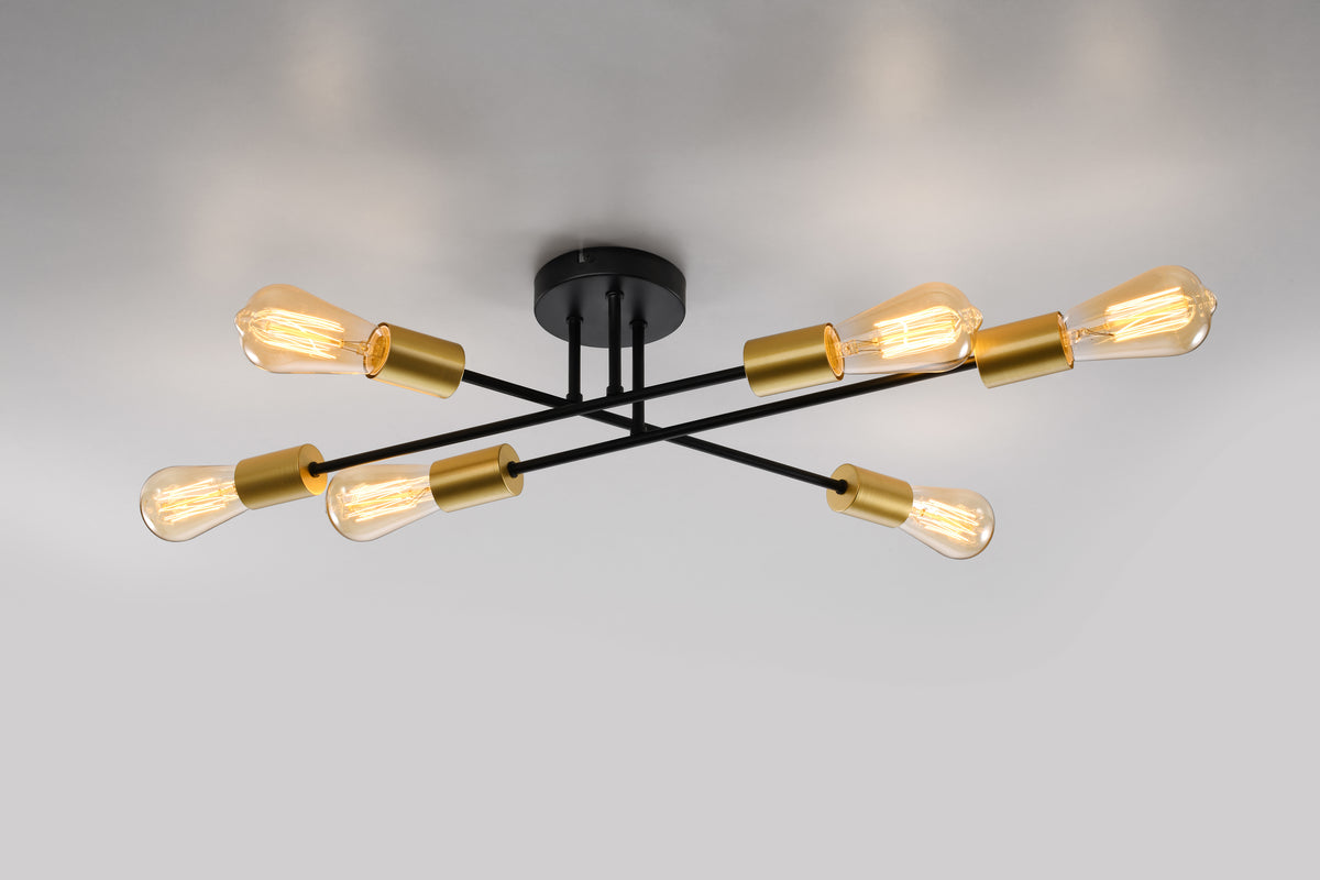 Plafonnier allumé sur plafond clair, ampoules à filament diffusant une lumière chaude